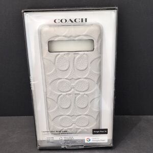 New In Box Coach Leather Light Gray Slim Wrap Google Pixel 7A Phone Case.